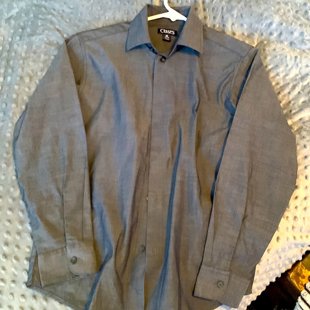 Boys long sleeve dress shirts.Size 10-12. One light blue, one dark grey.